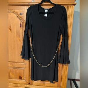Elegant Black Dress with Gold Chain Accent